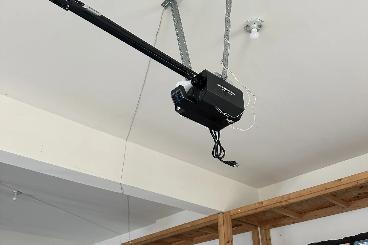 Installed garage door opener in a residential garage
