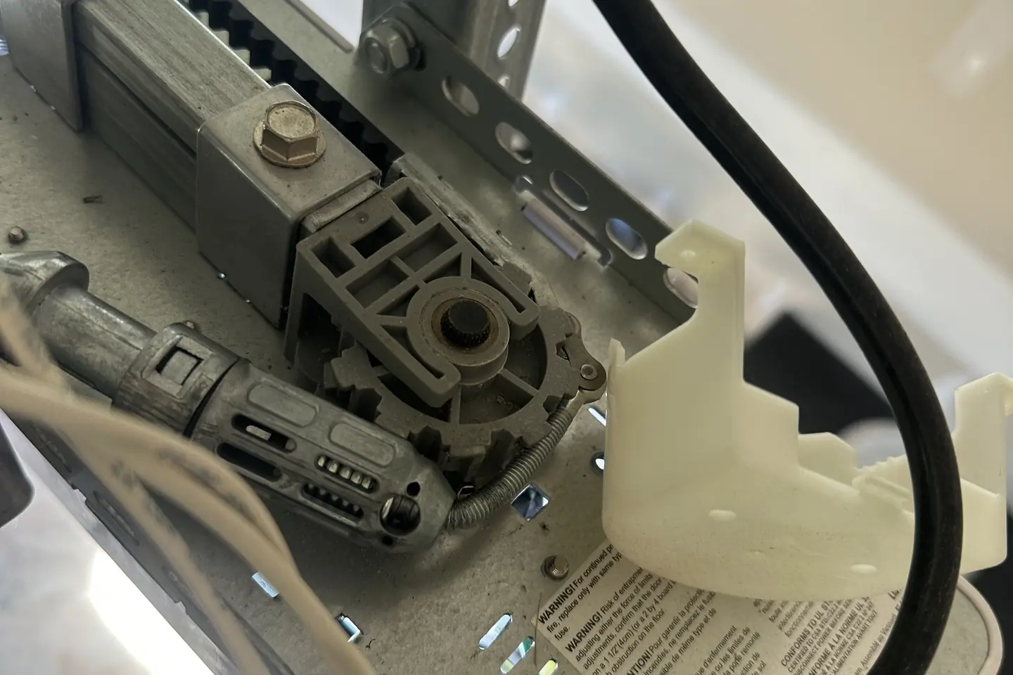 Garage door opener and rail system inside a garage