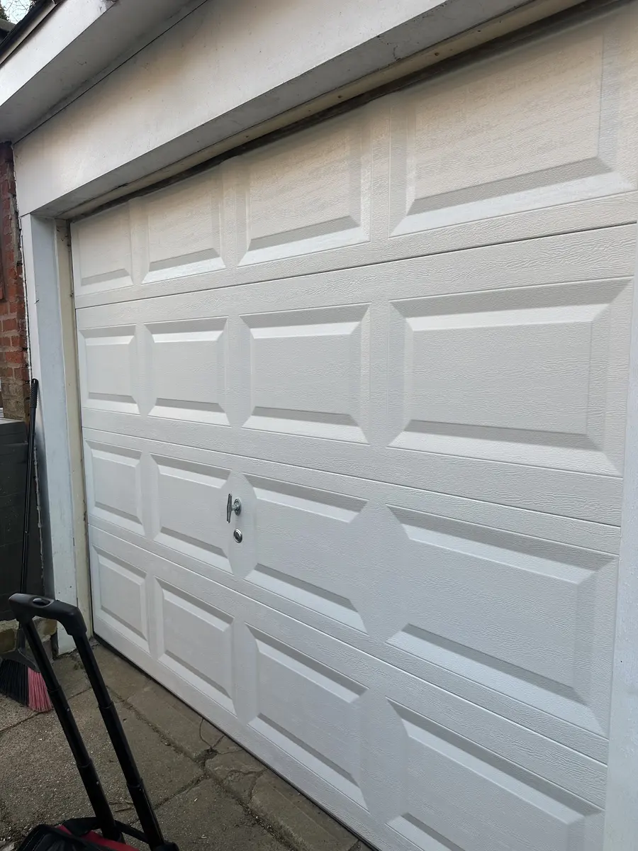 New white garage door after installation